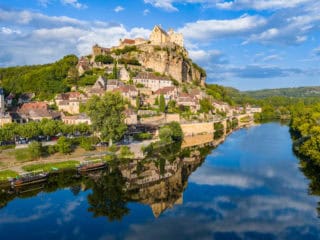 Aerial view of Beynac-et-Cazenac, one of the most beautiful villages in France, on the Dordogne River